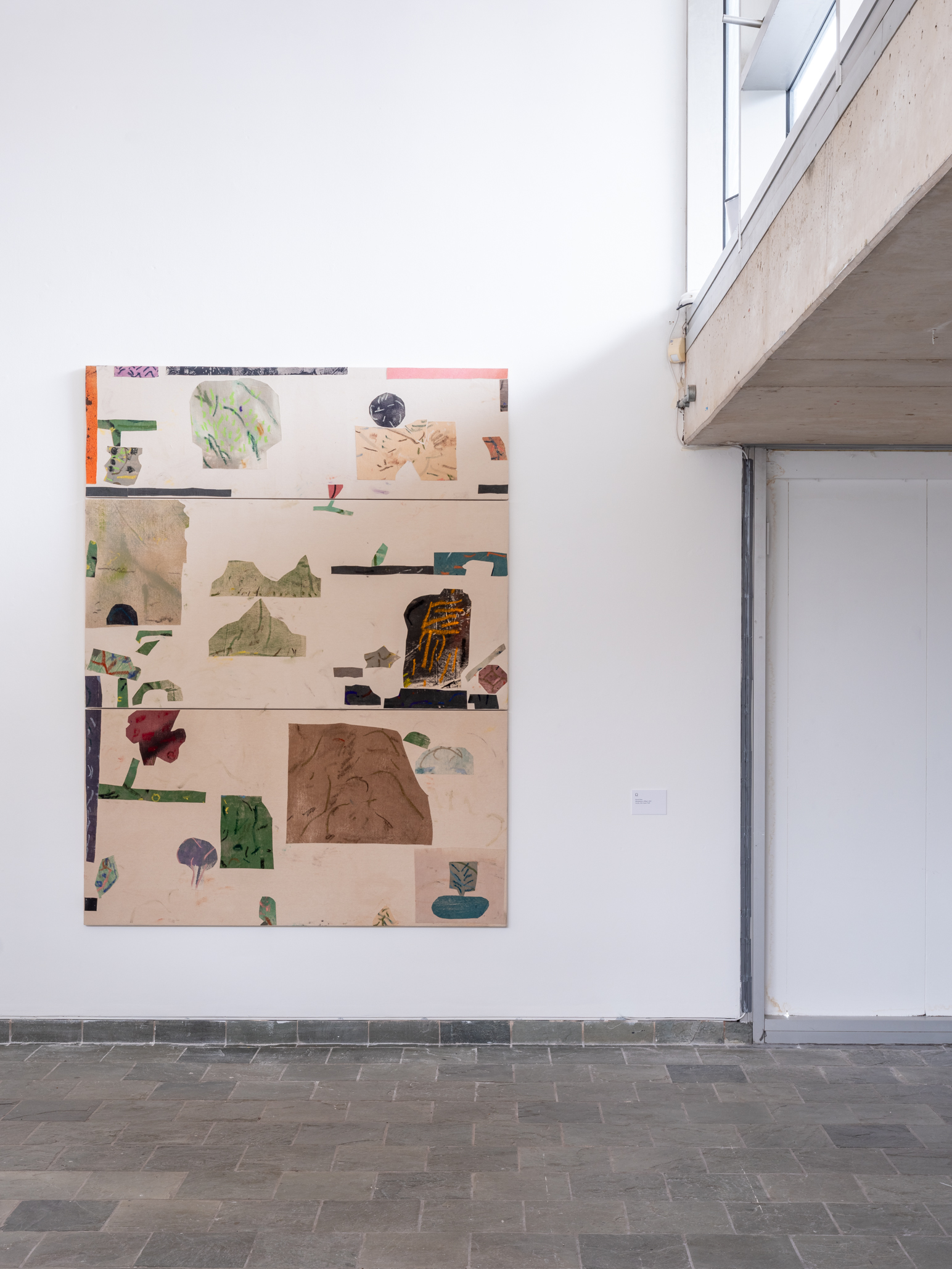 Large collage piece by David Orme installed on gallery wall.